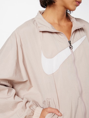 Nike Sportswear - Chaqueta de entretiempo en beige