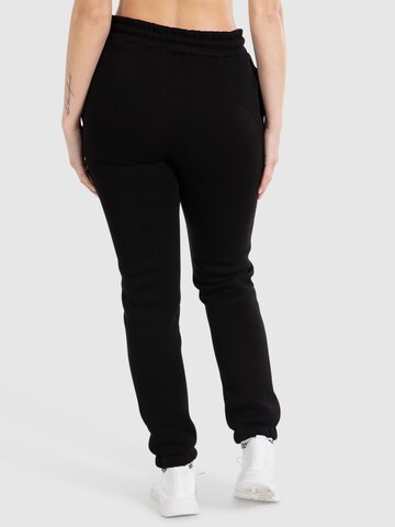 Effilé Pantalon ' Amaya ' Smilodox en noir