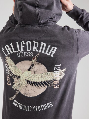 GUESS Sweatshirt 'HERON' in Schwarz