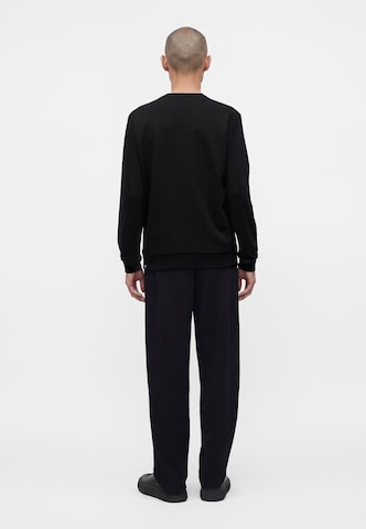 EA7 Emporio Armani Sweatshirt i svart: baksida