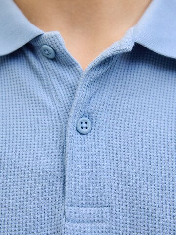 T-Shirt 'JJEAUSTIN' Jack & Jones Plus en bleu