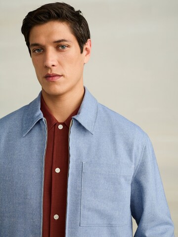 Next Tussenjas in Blauw