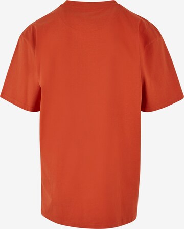 Tricou de la Karl Kani pe portocaliu