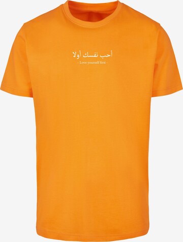 Merchcode Shirt 'Love Yourself First' in Orange: predná strana