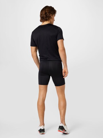 Skinny Pantaloni sport de la ASICS pe negru