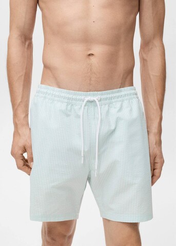 MANGO MAN Swim Trunks in Blue: front