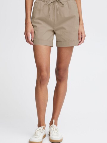 Oxmo - Loosefit Calças chino ' Chanel ' em bege: frente