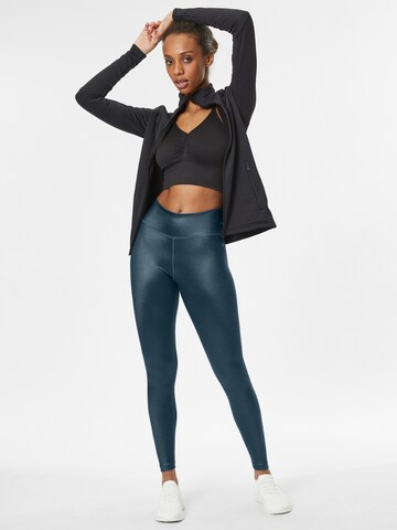 NIKE Skinny Workout Pants in Green