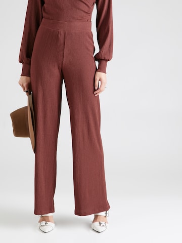 ABOUT YOU Loose fit Trousers 'Emina' in Brown: front