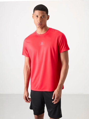 T-Shirt fonctionnel Tommy Life en rouge : devant