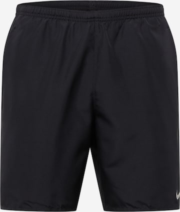 NIKE Regular Workout Pants in Black: front