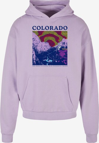 Merchcode Sweatshirt 'Peanuts - Colorado' in Purple: front