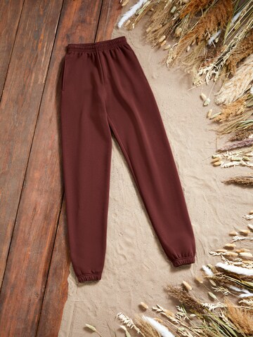 Kendall for ABOUT YOU Loose fit Pants 'Dillen' in Brown