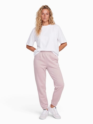 Effilé Pantalon 'Studio' Nike Sportswear en beige