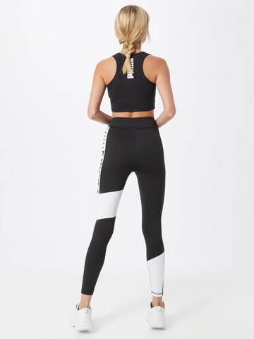 Skinny Pantaloni sport de la PUMA pe negru