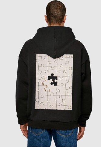 Merchcode Sweatshirt 'Missing Piece' in Zwart