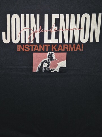 John Lennon Koszulka 'John Lennon Instant Charma T-Shirt' w kolorze czarny