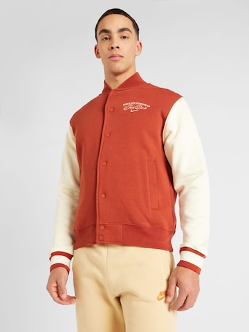 Nike Sportswear Prehodna jakna 'VARSITY' | oranžna barva: sprednja stran