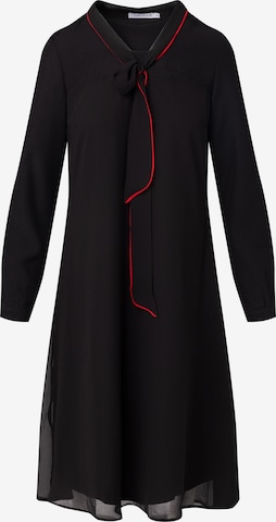 melns Quiosque Kleita: no priekšpuses