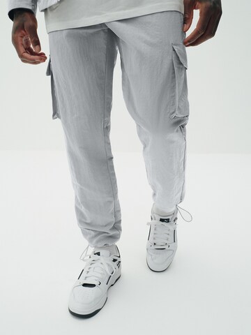 Sinned x ABOUT YOU Tapered Cargo Pants 'Marlo' in Green