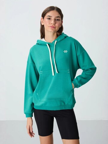Felpa di Tommy Life in verde: frontale