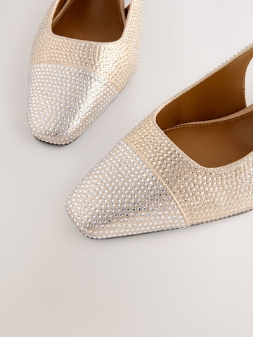 Next - Zapatos destalonado en oro