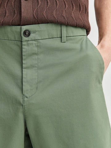 Loosefit Pantalon chino Next en vert