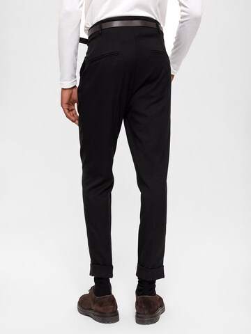 Antioch Tapered Trousers in Black