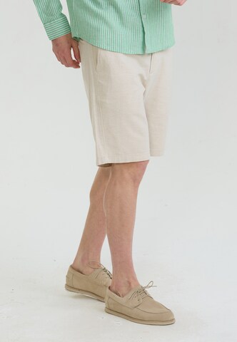 Felix Hardy Slim fit Trousers in Bronze