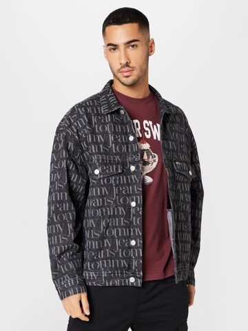 Tommy Jeans - Chaqueta de entretiempo 'Trucker' en gris: frente