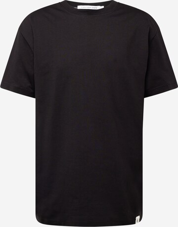 T-Shirt Calvin Klein Jeans en noir : devant