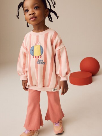 Set Next en rose