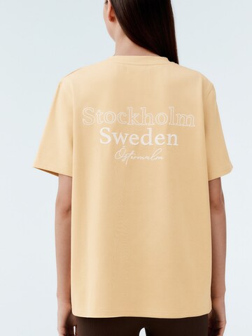 Next - Camisa em amarelo: frente
