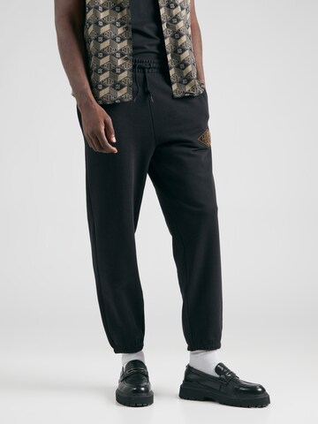 Tapered Pantaloni 'Dacusi' di HUGO in nero: frontale