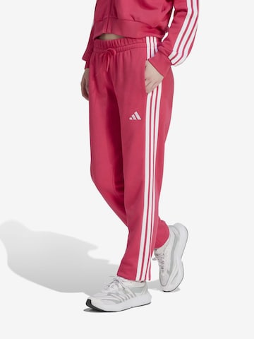 ADIDAS SPORTSWEAR Tapered Urheiluhousut 'ESSENTIALS 3-STRIPES FRENCH TERRY CUFFED' värissä vaaleanpunainen: etupuoli