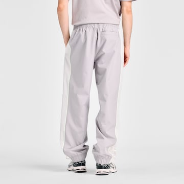 new balance Wide leg Sportbroek 'Trackside Woven Pant' in Grijs