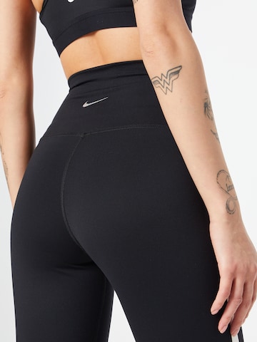 Skinny Pantaloni sport de la NIKE pe negru