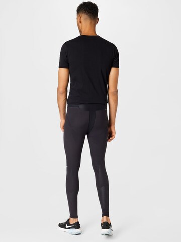 NIKE Skinny Sportovní kalhoty – černá