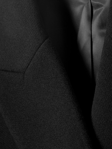 Manteau mi-saison 'Logan' WEEKDAY en noir
