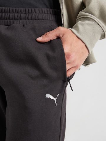 PUMA Regular Sportbroek 'EVOSTRIPE' in Zwart
