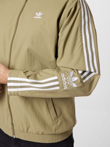 ADIDAS ORIGINALS Přechodná bunda – zelená