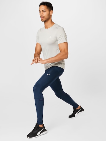 ASICS Skinny Urheiluhousut värissä sininen