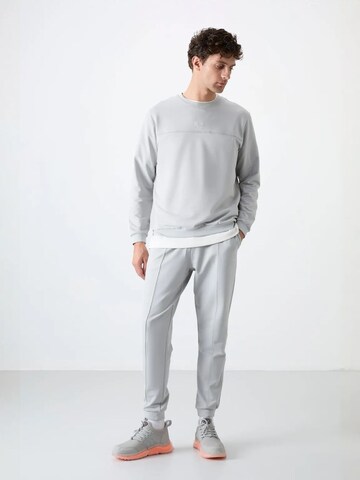 Tuta da jogging di Tommy Life in grigio