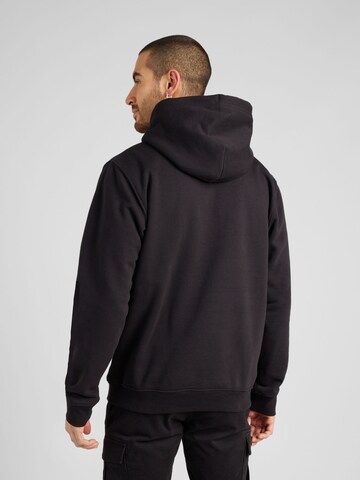 Sweat-shirt 'Essential' Tommy Jeans en noir