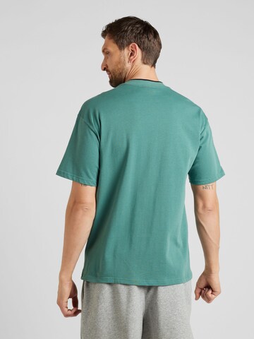 Nike Sportswear T-shirt 'AIR' i grön