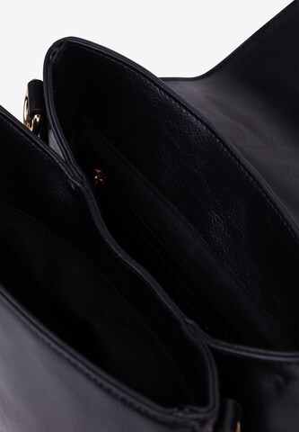 Usha Handbag in Black