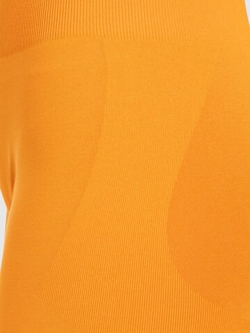 Smilodox Slimfit Sportbroek ' Scrunch Edina ' in Oranje