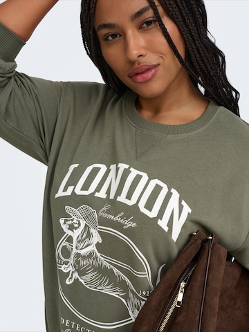 ONLY Carmakoma - Sweatshirt 'CARAMELIA' em verde
