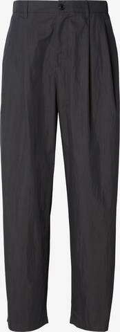 Calvin Klein Baggy Pleat-front trousers in Grey: front