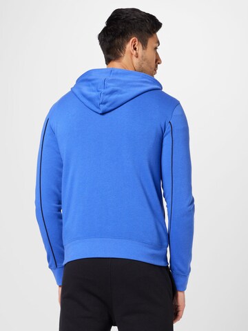 Champion Authentic Athletic Apparel Trainingsanzug in Blau